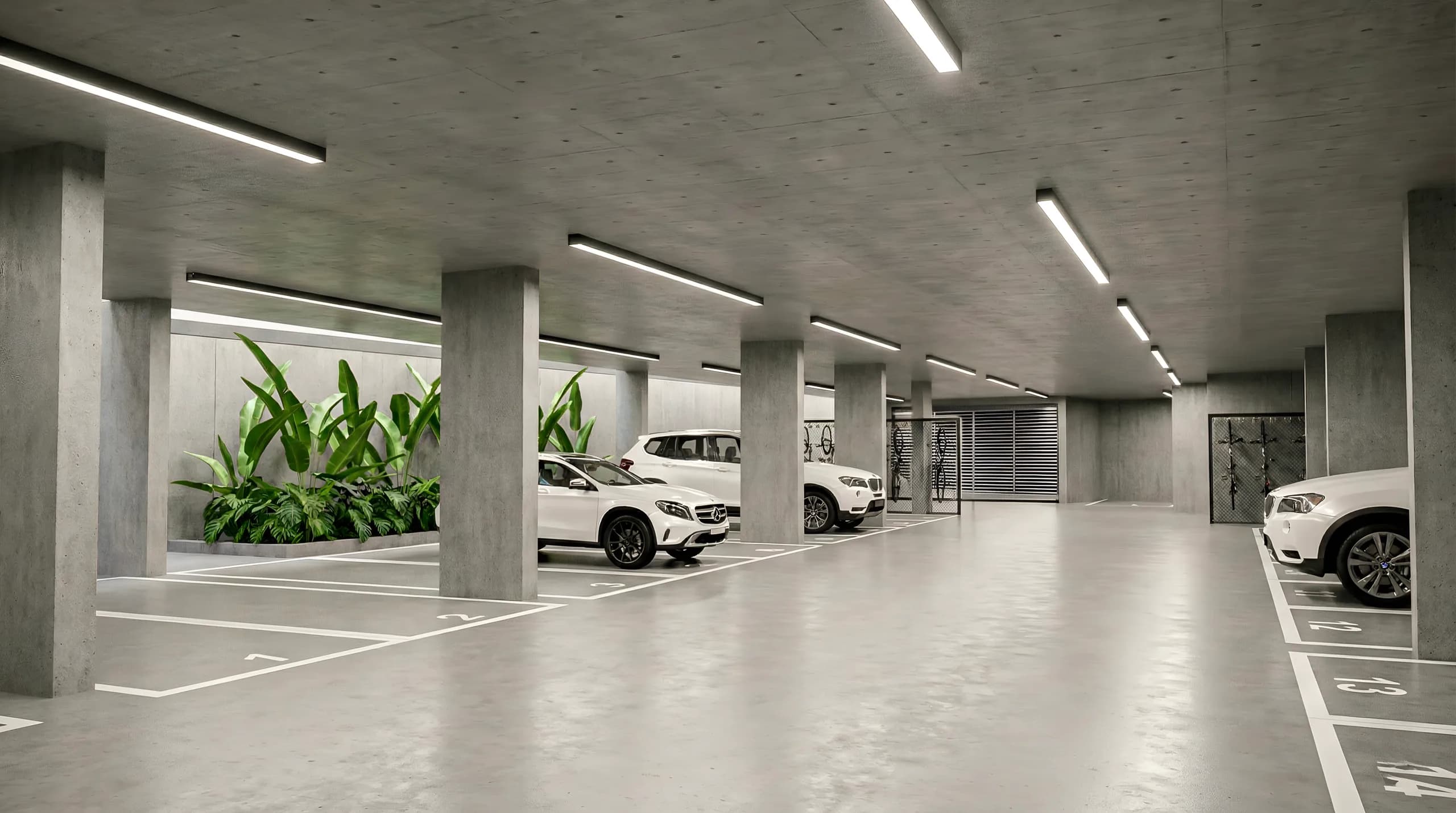 Estacionamento coberto do Vista São Lourenço, com vagas demarcadas